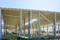 New large building steel framework with corrugated steel roof on reinforced concrete supports