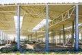 New large building steel framework with corrugated steel roof on reinforced concrete supports Royalty Free Stock Photo