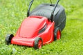 New lawnmower on green grass Royalty Free Stock Photo