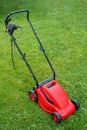 New lawnmower on green grass Royalty Free Stock Photo
