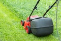 New lawnmower on green grass Royalty Free Stock Photo