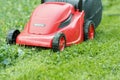 New lawnmower on green grass Royalty Free Stock Photo