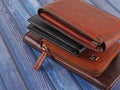 New leather multicolored wallets on blue background