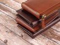 New leather multicolored wallets on wooden background
