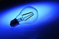 New led lamp bulb over blue background Royalty Free Stock Photo