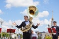 New Life Brass band, wind musical instrument player, orchestra performs music, man musician plays big sousaphone, trumpeter Royalty Free Stock Photo