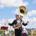 New Life Brass band, wind musical instrument player, orchestra performs music, man musician with sousaphone, helicon