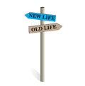 New life old life color road sign boards. use us for positive thoughts business or background. Royalty Free Stock Photo