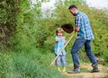 New life. soils and fertilizers. father and son planting family tree. rich natural soil. Eco farm. Ranch. happy earth