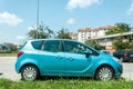 New light blue Opel Meriva 1.7 CDTI Enjoy car parked on the street in the city.