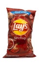 New Liskeard, Ontario, Canada -February 27, 2023 : a bag of Lay\'s Ketchup potato chips on a white background