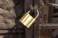 New lock on old rusty bars Royalty Free Stock Photo