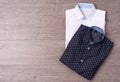 New man`s shirt on wood background. Royalty Free Stock Photo