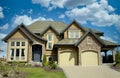 New Mansion Stucco Rock Exterior Maison Home House Cumulus Clouds Sky Background Royalty Free Stock Photo