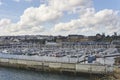 The new Marina at Brest, full of Yachts and Motorboats all moored neatly against their individual floating Pontoons.