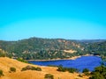 New Melones Lake and golden hills Royalty Free Stock Photo