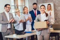 New female member of team, newcomer, applauding to female employee, congratulating office worker with promotion