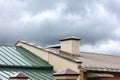 New metal roofs of old houses wet after heavy rain Royalty Free Stock Photo