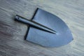 The new metal shovel is gray Royalty Free Stock Photo