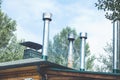 New metal ventilation chimneys on the roof. Royalty Free Stock Photo