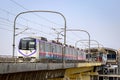 New metro train runs on overhead track near Phugewadi.