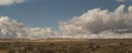 New Mexico landscape with power lines and clouds Royalty Free Stock Photo