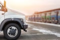 New middle size trucks at dealership parking outdoors at winter. Truck service and maintenance. Delivering and warehouse service Royalty Free Stock Photo