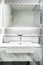 New mirror and ceramic washbasins on granite counter Royalty Free Stock Photo