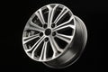 New modern alloy wheel with grey inserts, side view