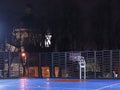 A new modern ball-free area in the lights of the night city. Evening sports in Lviv in Ukraine. Healthy lifestyle among citizens.