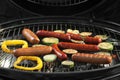 New modern barbecue grill with tasty  and vegetables, closeup Royalty Free Stock Photo