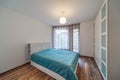 New modern bedroom. New home. Interior photography. Wooden floor.