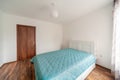 New modern bedroom. New home. Interior photography. Wooden floor.