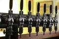 New modern beer taps in pub. Professional bar equipment Royalty Free Stock Photo