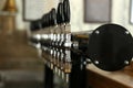 New modern beer taps in pub. Professional bar equipment Royalty Free Stock Photo