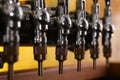 New modern beer taps in pub. Professional bar equipment Royalty Free Stock Photo