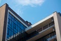 New modern building glass facade and balconies. Reflection of the sky in mirrored windows Royalty Free Stock Photo