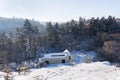 New modern dream house apartments in snowy valley on sunny freezing winter day