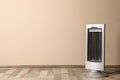 New modern electric heater on floor in room, space for text Royalty Free Stock Photo