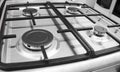 New modern gas stove with four burners for the kitchen, stainless steel surface