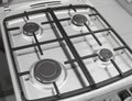 New modern gas stove with four burners for the kitchen, stainless steel surface Royalty Free Stock Photo