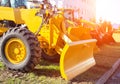 New modern grader for planning and moving soil. Road construction and leveling, industry Royalty Free Stock Photo