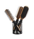 New modern hair brushes in metal holder isolated