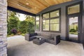 New modern home features a backyard with patio Royalty Free Stock Photo