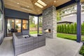 New modern home features a backyard with patio Royalty Free Stock Photo