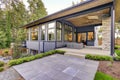 New modern home features a backyard with patio Royalty Free Stock Photo
