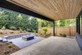 New modern home features a backyard with patio Royalty Free Stock Photo