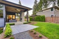 New modern home features a backyard with patio Royalty Free Stock Photo