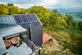New modern house cottage with solar photovoltaic panel system on roof. Aerial view. Royalty Free Stock Photo