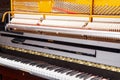 New modern piano with open strings